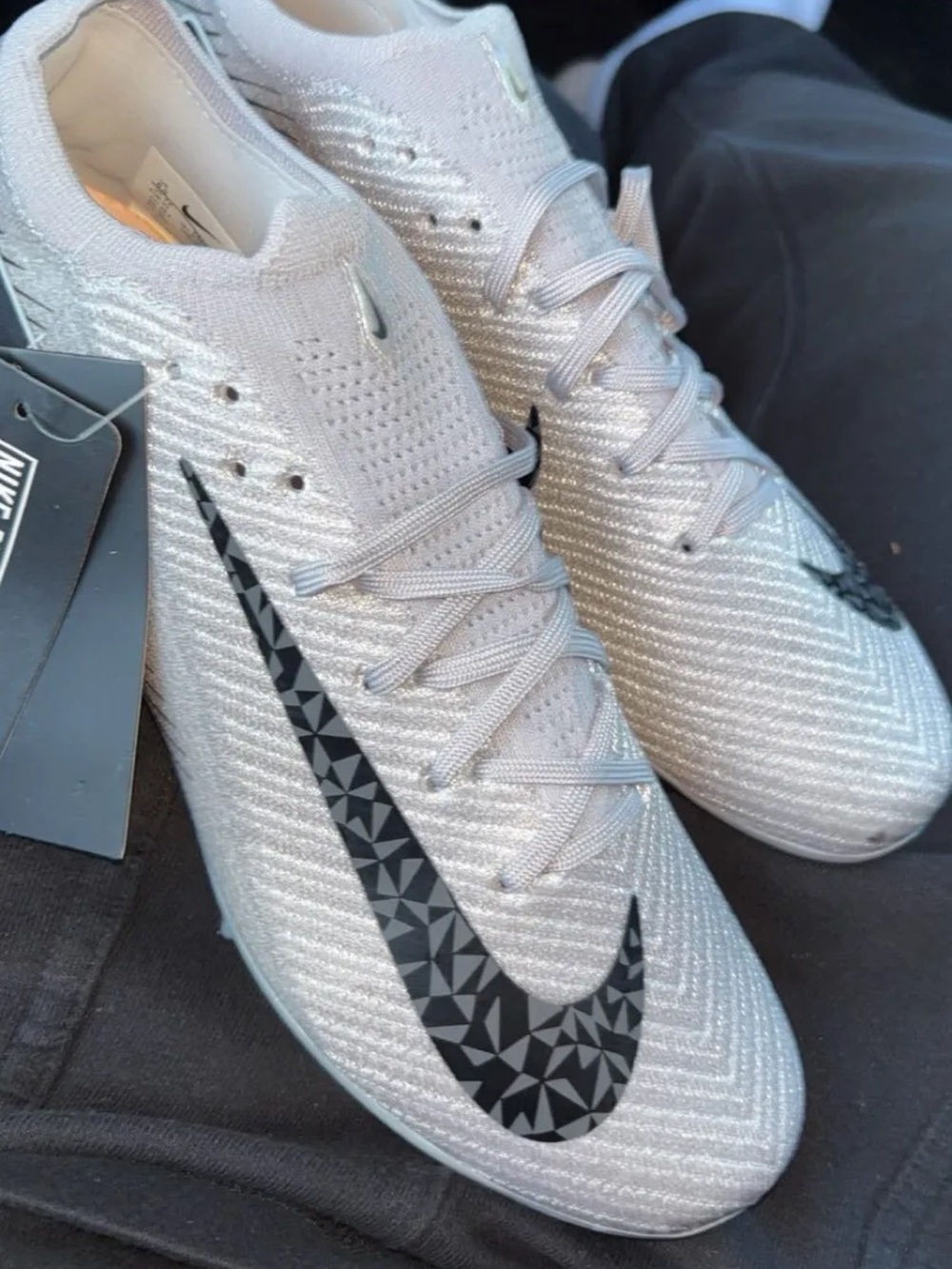 Nike Women's Silver Soccer Cleats with Black Geometric Swoosh